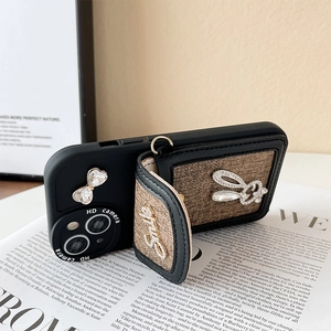 Detail of rhinestone rabbit wallet phone case for iPhone with luxury strap and card holder