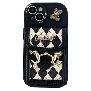 Crossbody iPhone case with black quilted card holder, golden letters and bear charm