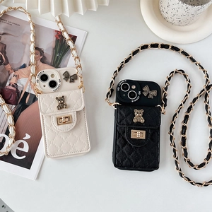 Crossbody iPhone case with quilted wallet card holder, metal bear and bow detail