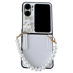 White leather folding phone case with sparkling bow and elegant pearl handle strap