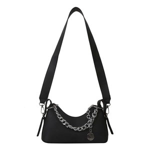Minimalist black crescent shoulder bag with silver chain and adjustable wide strap
