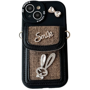 Luxury iPhone wallet case with rhinestone bunny, smile logo and crossbody strap loops