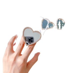 Luxury heart-shaped mirror phone grip with sparkling diamond-encrusted frame design