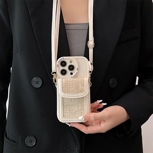 Detail of crossbody phone case with cream tweed wallet and adjustable leather strap