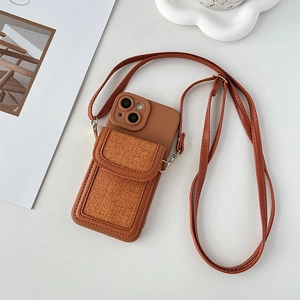Caramel brown iPhone case with textured card slot and adjustable crossbody shoulder strap