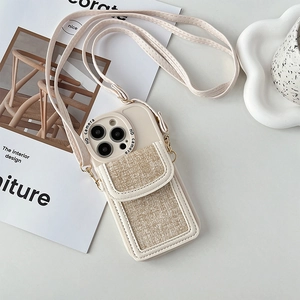 Close-up of cream leather iPhone case with crossbody strap and woven texture wallet