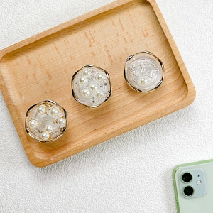 Three-piece set of elegant resin phone grips with pearls and gold foil in wavy metal frames