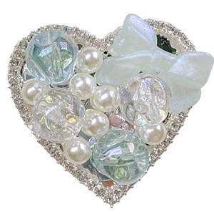 Luxe heart phone grip featuring faux pearls, rhinestones and a turquoise bow charm