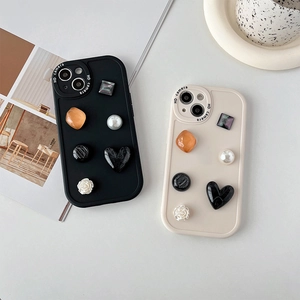 Luxe iPhone case with 3D pearls, marble hearts and floral gems in black and cream white