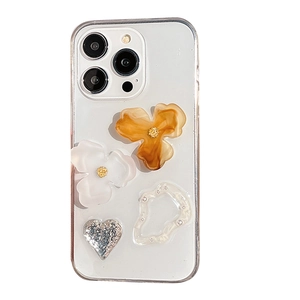 Clear iPhone case featuring 3D floral patterns, silver sequins, and pearl accents