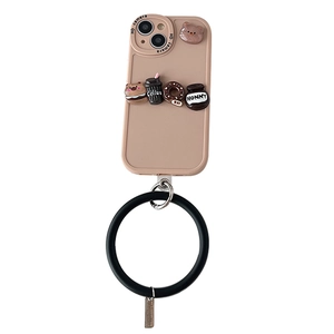 Brown iPhone case with 3D coffee bear donuts and a black silicone wrist strap ring