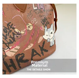 Close-up of the premium lychee texture leather and colorful graffiti fox on the camera bag
