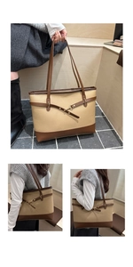 Detail view of large capacity color-block tote bag with metal buckle and shoulder straps