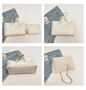 Detail of off-white tote bag with matching zipper pouch and fine PU leather texture