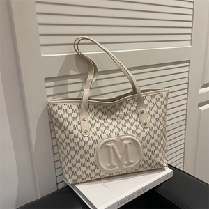 Large capacity off-white tote bag with embossed M logo and monogram printed pattern