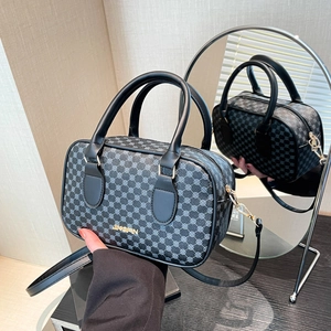 Vintage Boston style square bag in dark grey monogram pattern with gold hardware accents