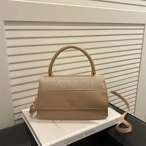 Elegant beige square handbag with sparkling silver rhinestones and gold hardware strap