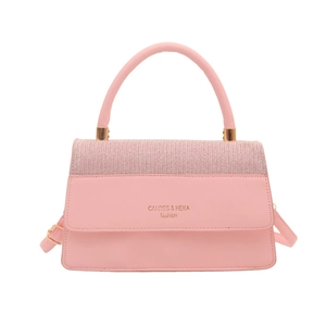 Pink crossbody square bag with sparkling rhinestones and golden hardware on white background