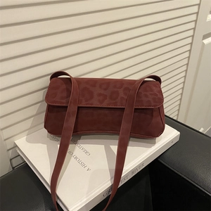 Retro burgundy baguette shoulder bag with leopard embossed texture and sleek straps