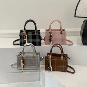 Retro square crossbody bags in black, pink, silver, and brown with beaded charms
