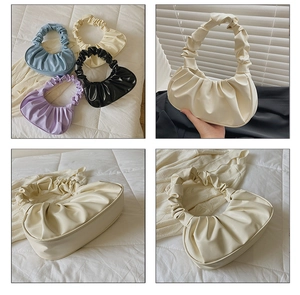 Detailansicht der weichen, plissierten Cloud-Handtaschen aus hochwertigem PU-Leder