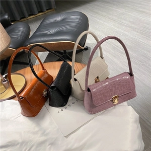 Chic croc-effect shoulder bags in orange, black, cream, and lilac with gold buckles