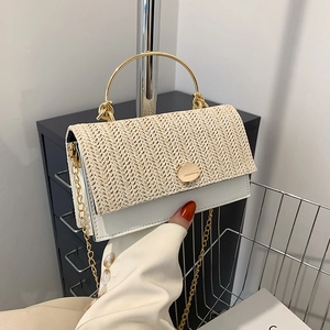 Chic cream woven crossbody bag with gold round handle and chain strap for women