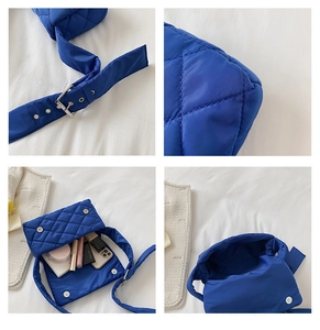 Vue détaillée du sac en nylon matelassé bleu vif avec fermeture magnétique et sangle