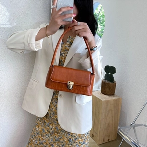 Vintage orange faux crocodile leather shoulder bag with gold metal buckle closure