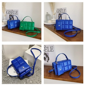 Detailed view of quilted plaid shoulder bag set with matching small detachable pouch