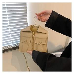 Detail of creative jacket-shaped crossbody bag with zipper and stitching in khaki finish