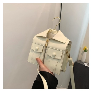 Creative off-white jacket-shaped crossbody bag featuring collar and zipper details