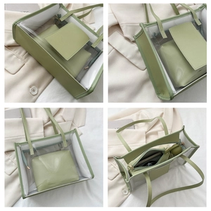 Detailed view of light green transparent tote bag with removable inner pouch