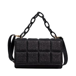 Chic black glitter crossbody bag with chain handle and quilted pattern for women