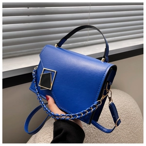 Blue PU leather crossbody bag with elegant gold geometric buckle and chain strap