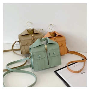 Detailed view of creative jacket shaped mini shoulder bags in khaki, orange, and mint green