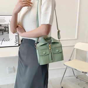 Unique jacket-shaped shoulder bag for women in elegant sage green textured leather