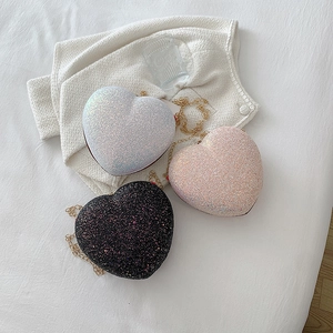 Sparkly heart-shaped sequin chain bags in white, pink, and black for women