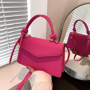 Chic rose pink woven texture crossbody bag with top handle and magnetic flap closure