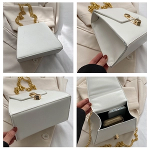 Detailed four-way view of white leather crossbody bag with golden paperclip lock