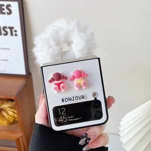 Close-up of Samsung Galaxy Z Flip case with plush handle and cute 3D doll details