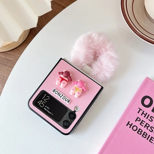 Pink Samsung Galaxy Z Flip protective case with plush ball pom-pom and cute girl design