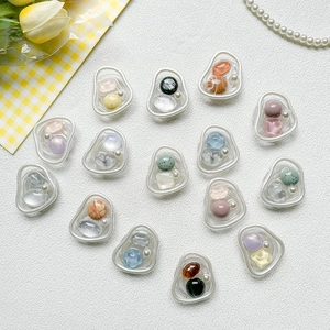 Variety pack of colorful resin bead phone sockets with elegant white matte frames