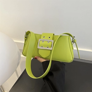 Lime green minimalist underarm bag with large silver buckle and matte PU leather