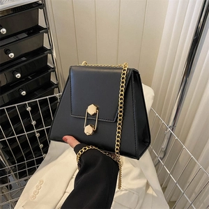 Chic black trapezoid chain bag with gold geometric interlocking buckle for women
