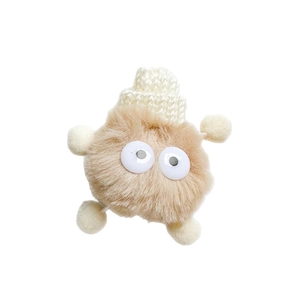 Cute fluffy little monster phone grip with brown fur and white knit hat for desk support