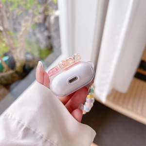 Clear AirPods Pro case with colorful 3D resin bears and a beaded wrist strap detail