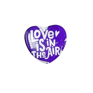 Purple heart-shaped expandable phone grip with Love Is In The Air text in minimalist style