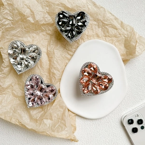Luxury heart rhinestone phone sockets in black white pink and champagne colors