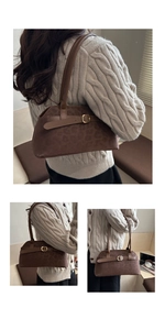 Detailed view of brown suede leopard print handbag with vintage gold buckle on model
